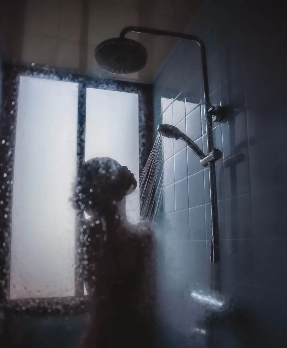 Naked girl taking a shower